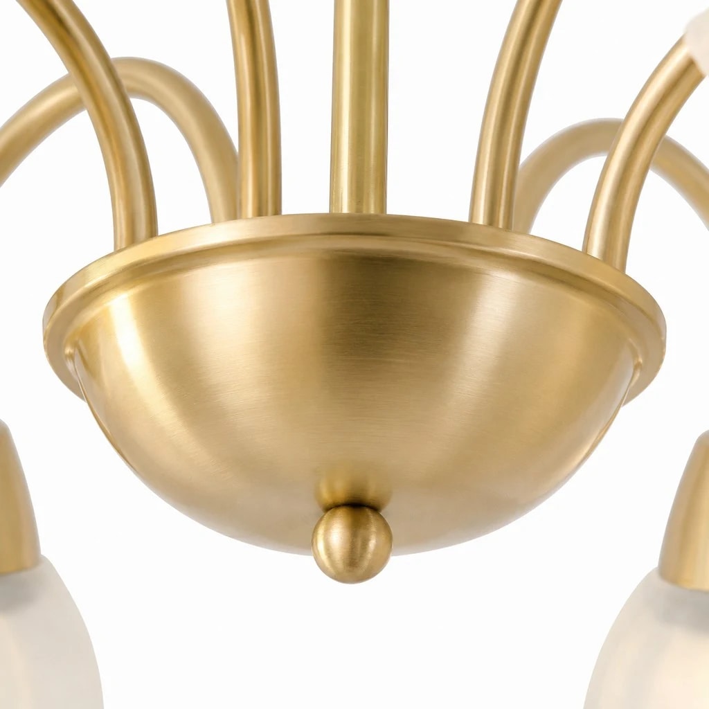 Close-up of the brushed gold central chandelier body