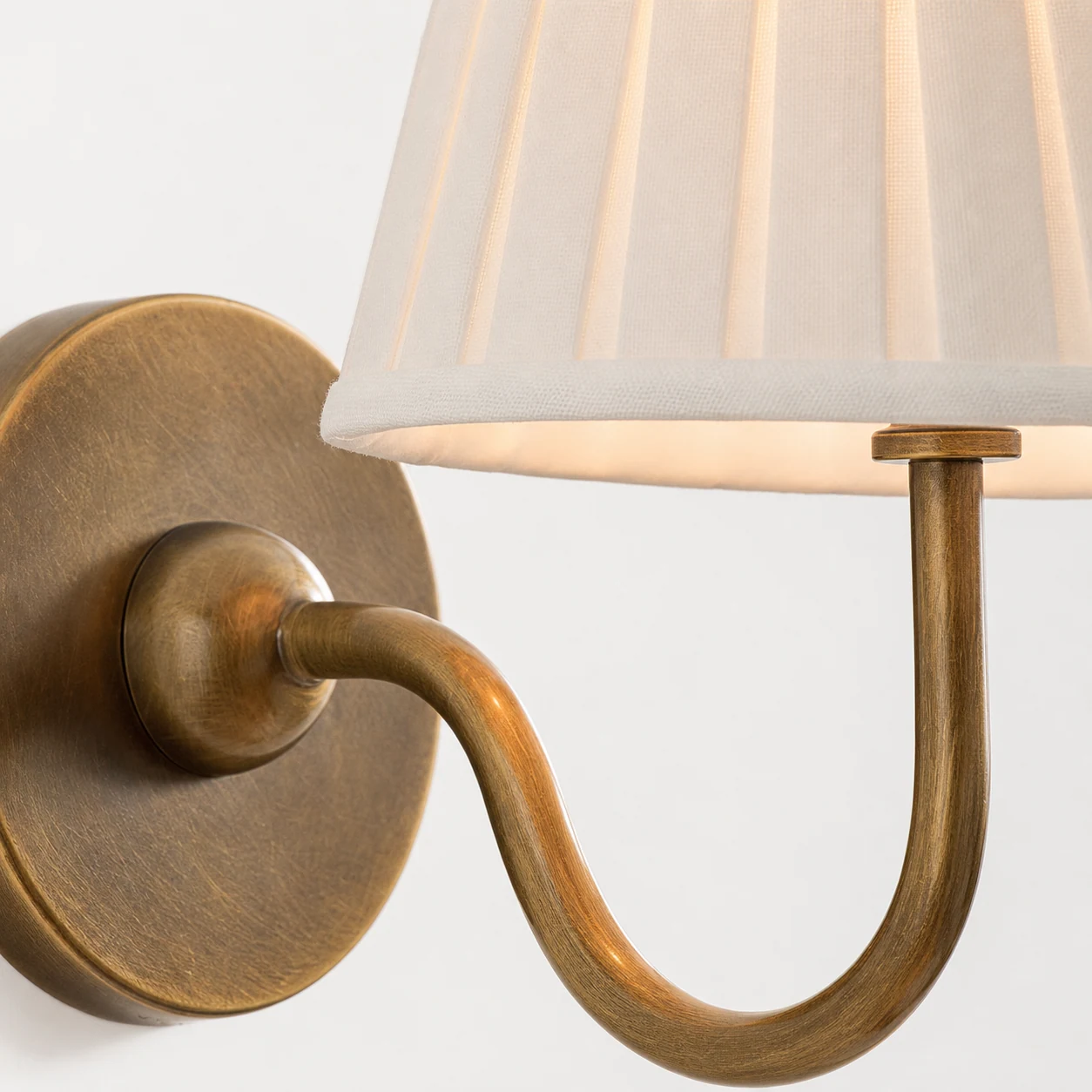 Close-up detail of the Luvora pleated shade and metal finish