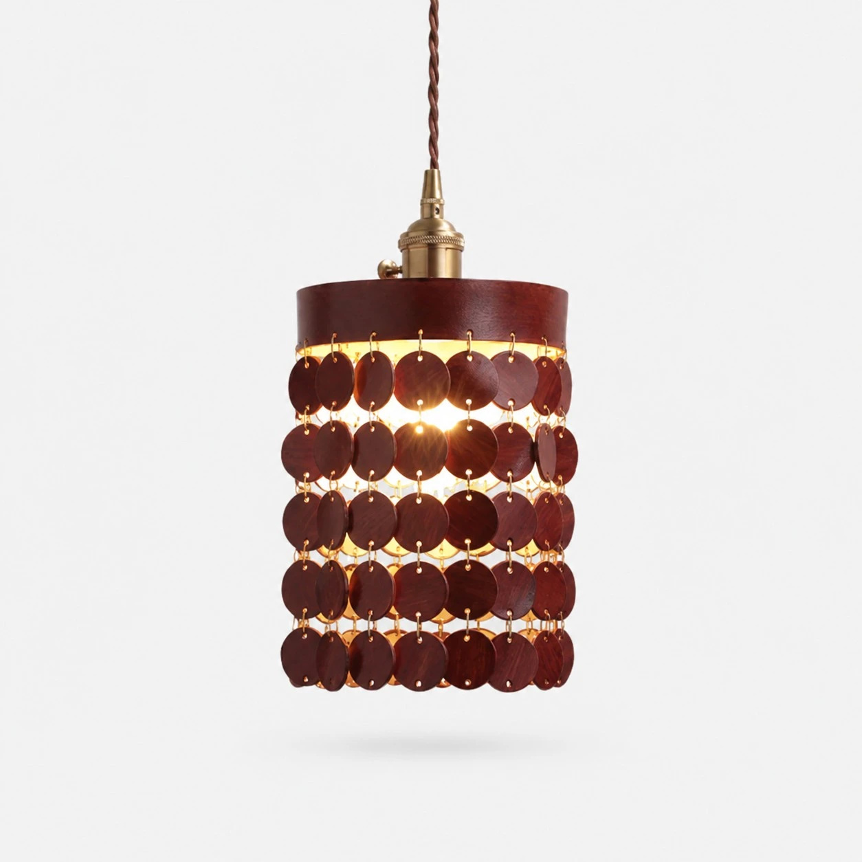 Brown leather pendant light on a white background