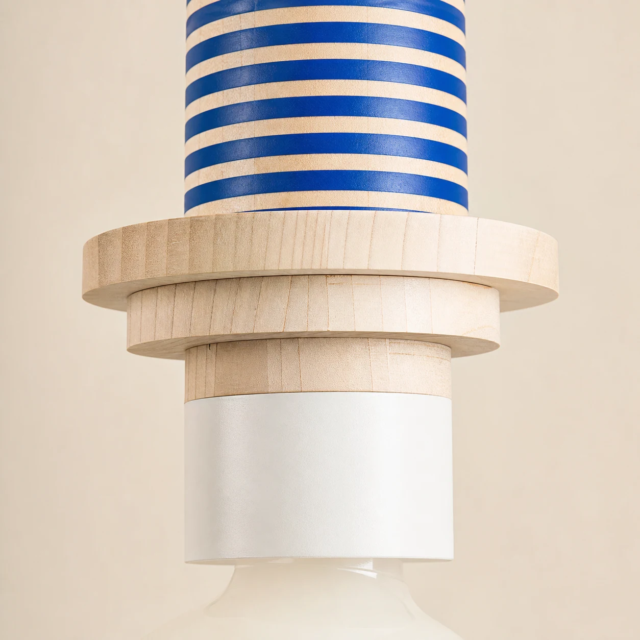 Close-up of the colored wood block pendant light finish and construction
